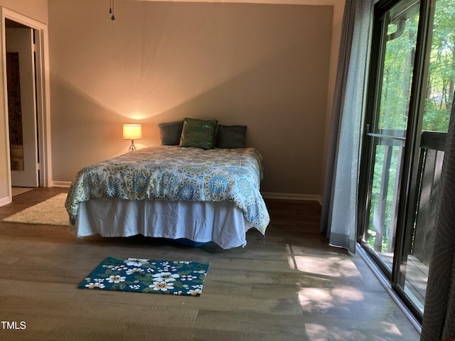 3082 Colony Rd Unit A, Durham, NC 27705 - bedroom featuring baseboards and wood finished floors