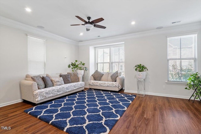1035 Brownsmith Dr, Apex, NC 27502 - living area featuring ceiling fan, wood finished floors, ornamental molding, and recessed lighting
