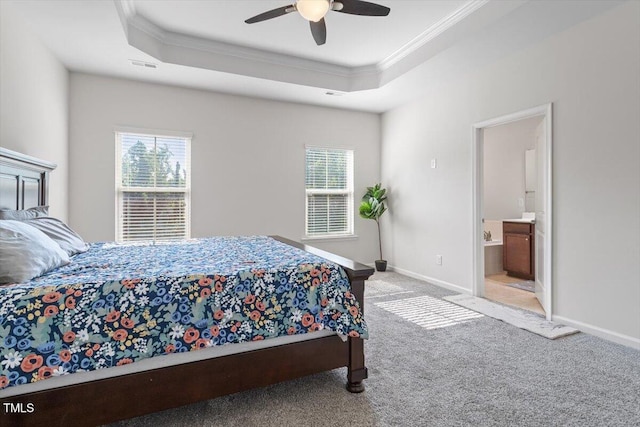1035 Brownsmith Dr, Apex, NC 27502 - bedroom featuring crown molding, multiple windows, a raised ceiling, carpet floors, and ensuite bathroom