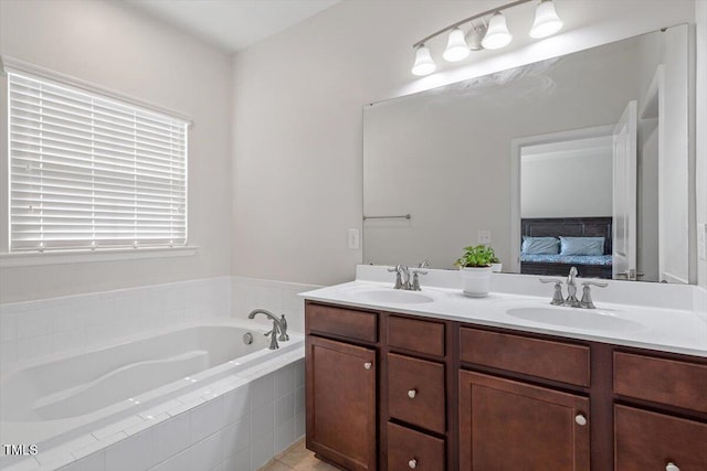 1035 Brownsmith Dr, Apex, NC 27502 - ensuite bathroom featuring double vanity and a bath