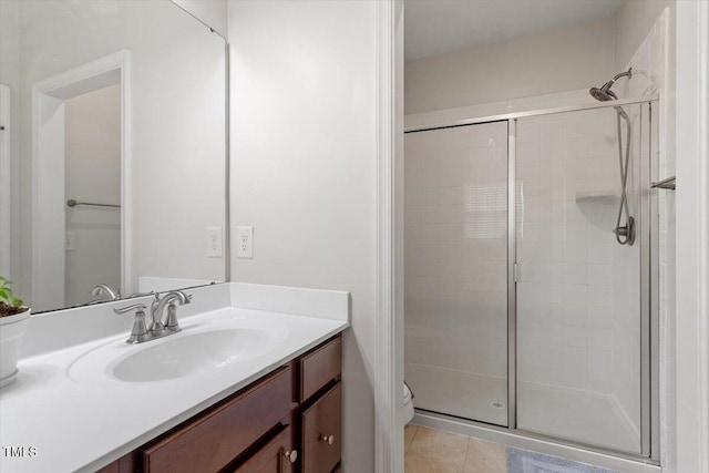 1035 Brownsmith Dr, Apex, NC 27502 - full bath with vanity, a shower stall, and tile patterned floors