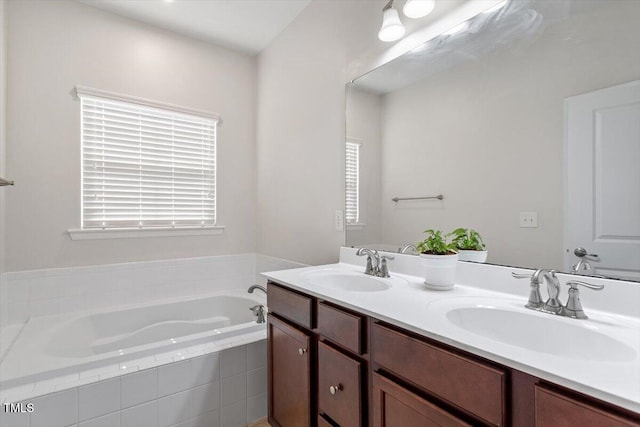 1035 Brownsmith Dr, Apex, NC 27502 - full bathroom featuring double vanity and a bath