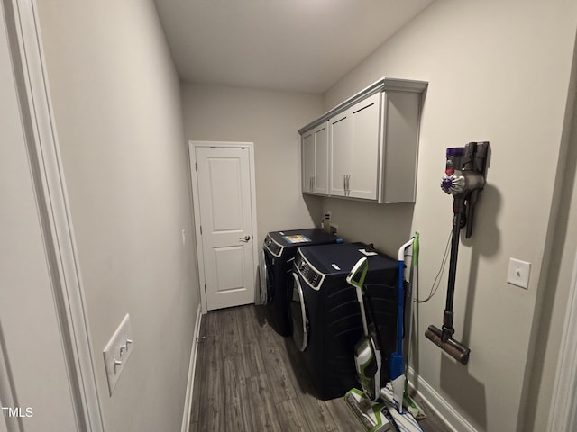 808 Heartpine Dr, Mebane, NC 27302 - laundry room featuring independent washer and dryer, dark wood-style floors, and cabinet space