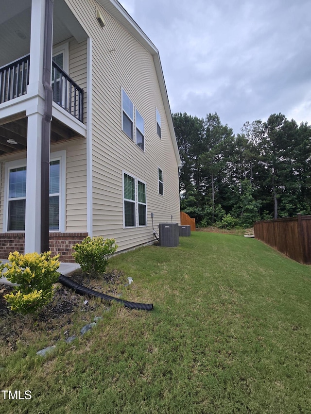 808 Heartpine Dr, Mebane, NC 27302 - view of property exterior with brick siding and a balcony