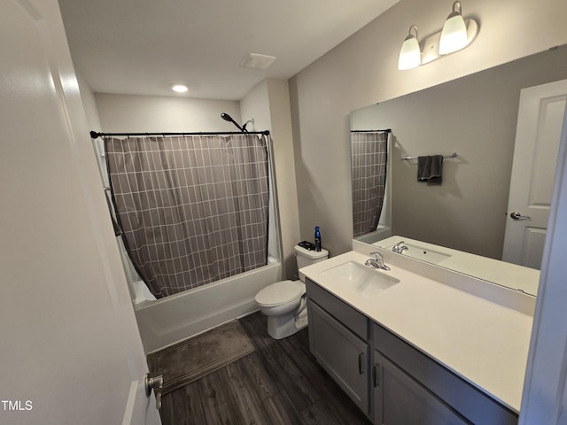 808 Heartpine Dr, Mebane, NC 27302 - full bathroom featuring vanity, wood finished floors, shower / tub combo, and recessed lighting