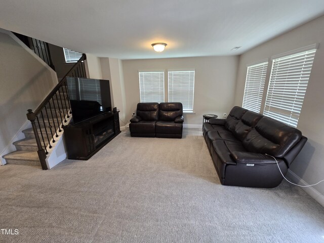 808 Heartpine Dr, Mebane, NC 27302 - living room featuring carpet, stairs, and healthy amount of natural light