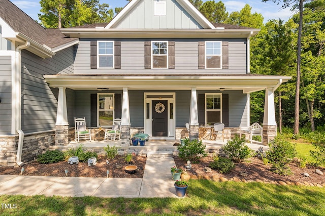 121 Roundrock Ln, Sanford, NC 27330 - craftsman house featuring a porch, board and batten siding, stone siding, and a shingled roof