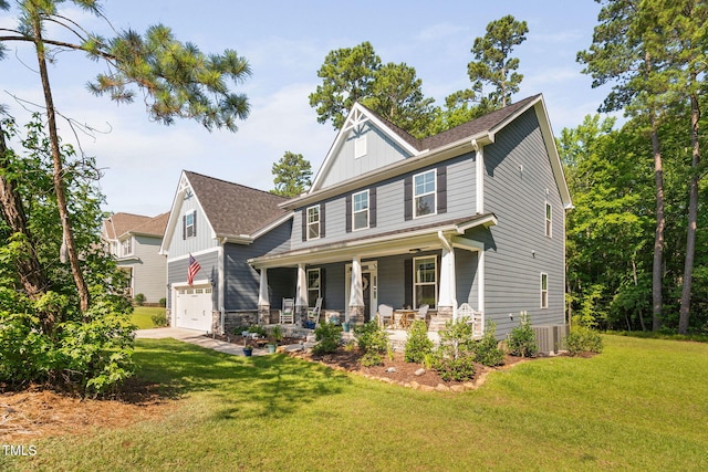 121 Roundrock Ln, Sanford, NC 27330 - craftsman-style house featuring covered porch, a garage, board and batten siding, and a front lawn