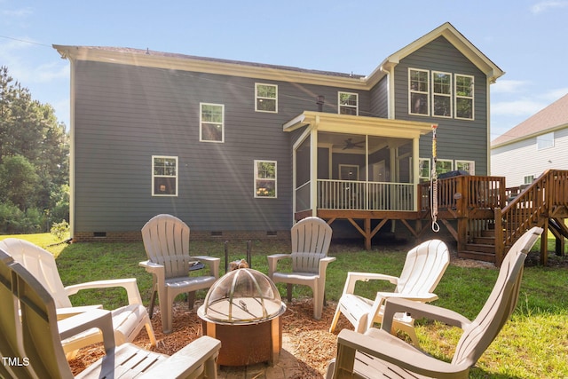 121 Roundrock Ln, Sanford, NC 27330 - rear view of property with crawl space, a fire pit, a sunroom, a ceiling fan, and stairway