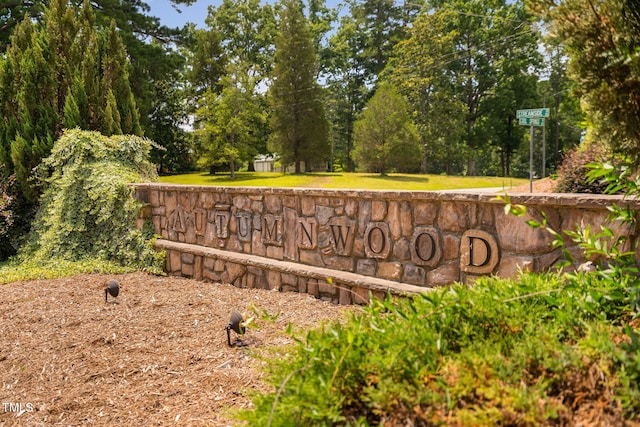 121 Roundrock Ln, Sanford, NC 27330 - community / neighborhood sign with view of wooded area and a yard