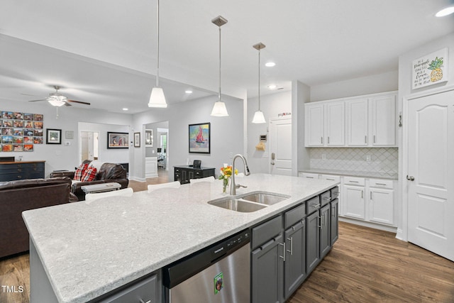 121 Roundrock Ln, Sanford, NC 27330 - kitchen with dishwasher, white cabinets, recessed lighting, dark wood-type flooring, and decorative backsplash