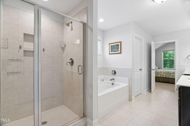 121 Roundrock Ln, Sanford, NC 27330 - bathroom featuring a garden tub, a stall shower, vanity, tile patterned floors, and ensuite bath