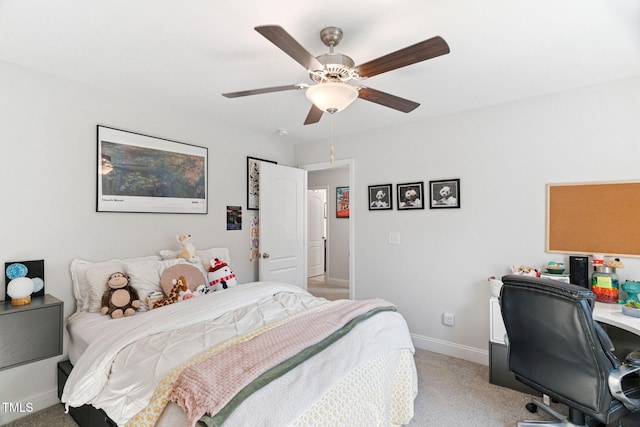 121 Roundrock Ln, Sanford, NC 27330 - bedroom featuring light colored carpet, a desk, and a ceiling fan