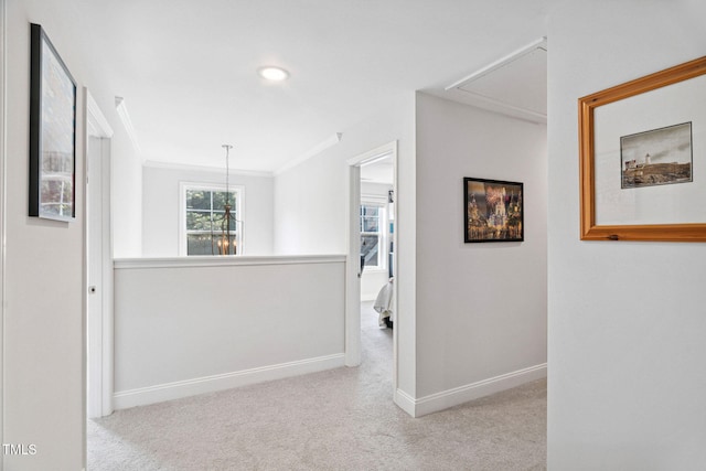 121 Roundrock Ln, Sanford, NC 27330 - hallway with attic access, carpet floors, and ornamental molding
