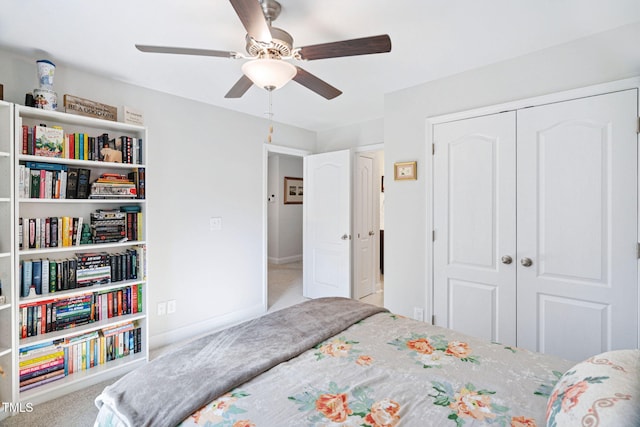 121 Roundrock Ln, Sanford, NC 27330 - bedroom with a closet, carpet flooring, and a ceiling fan