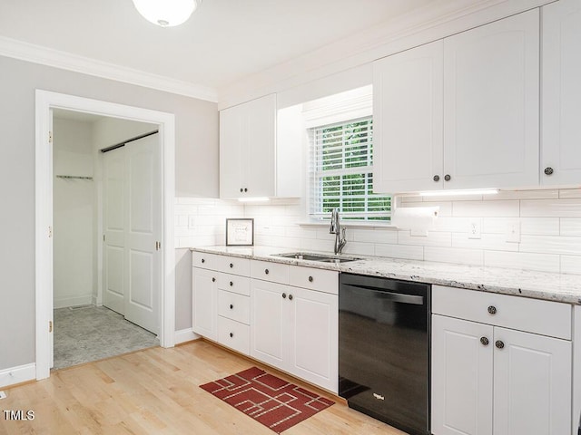 6843 Sawyer Rd, Liberty, NC 27298 - kitchen featuring dishwasher, backsplash, light wood finished floors, ornamental molding, and white cabinetry