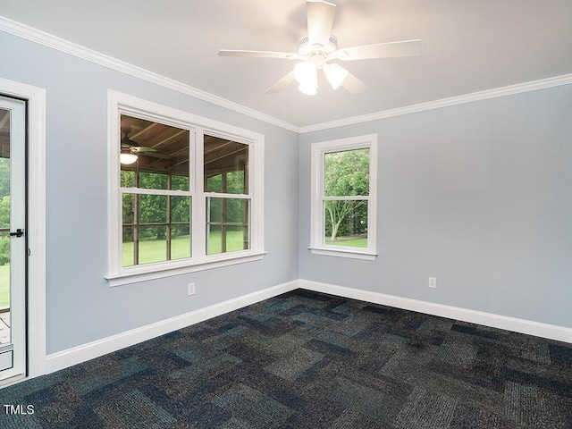 6843 Sawyer Rd, Liberty, NC 27298 - spare room featuring ceiling fan, dark carpet, and crown molding