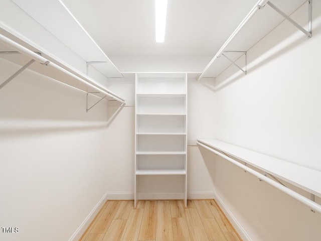6843 Sawyer Rd, Liberty, NC 27298 - walk in closet featuring wood finished floors