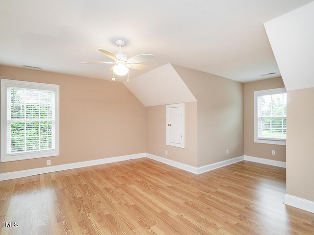 6843 Sawyer Rd, Liberty, NC 27298 - bonus room featuring light wood-type flooring, ceiling fan, and lofted ceiling