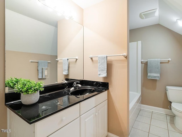 6843 Sawyer Rd, Liberty, NC 27298 - bathroom with vanity, tile patterned floors, and vaulted ceiling