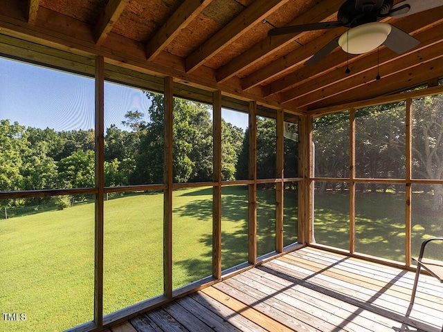 6843 Sawyer Rd, Liberty, NC 27298 - unfurnished sunroom with a ceiling fan, healthy amount of natural light, and view of wooded area