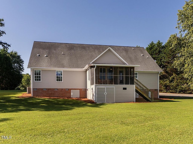 6843 Sawyer Rd, Liberty, NC 27298 - back of property featuring crawl space, a sunroom, a yard, stairs, and roof with shingles