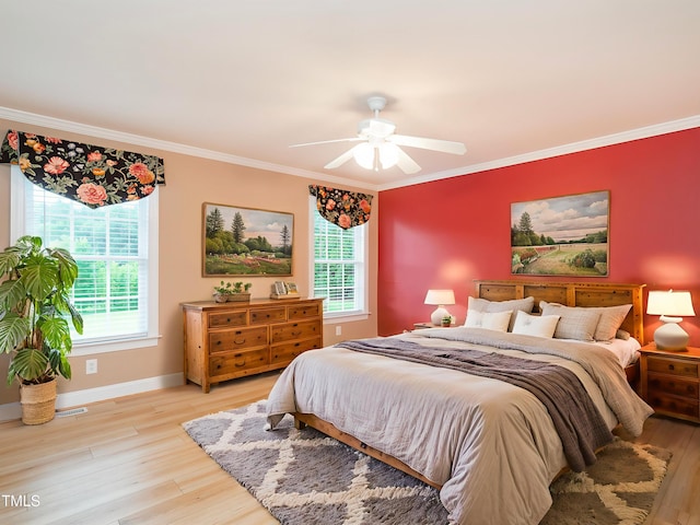 6843 Sawyer Rd, Liberty, NC 27298 - bedroom featuring crown molding, light wood finished floors, and ceiling fan
