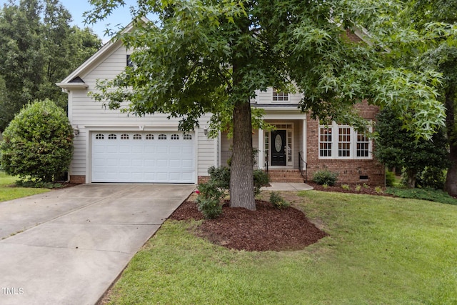 6104 Spicewood Dr, Fuquay Varina, NC 27526 - view of property hidden behind natural elements featuring a front lawn, driveway, and brick siding
