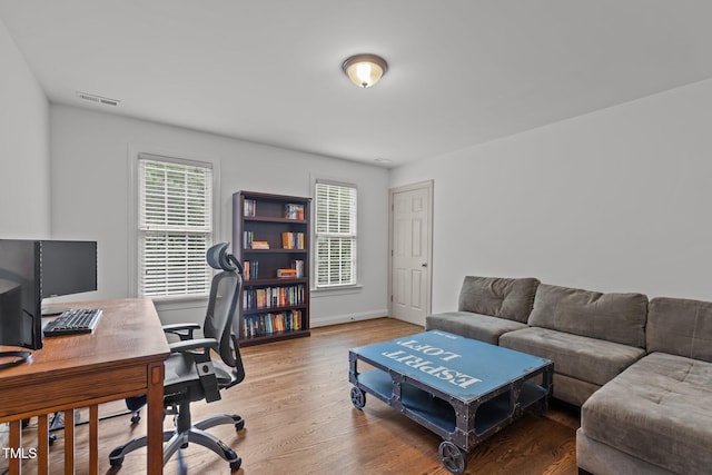 6104 Spicewood Dr, Fuquay Varina, NC 27526 - home office with wood finished floors and baseboards