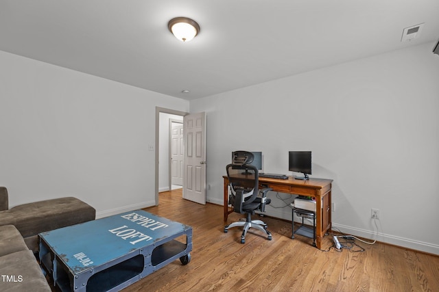 6104 Spicewood Dr, Fuquay Varina, NC 27526 - office area featuring baseboards and wood finished floors