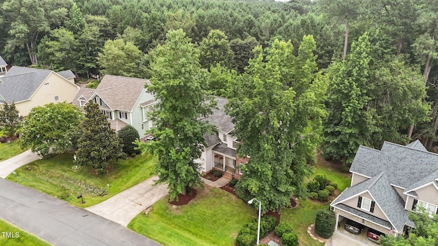 6104 Spicewood Dr, Fuquay Varina, NC 27526 - aerial view of residential area featuring a heavily wooded area