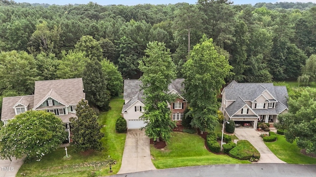 6104 Spicewood Dr, Fuquay Varina, NC 27526 - view from above of property with a heavily wooded area