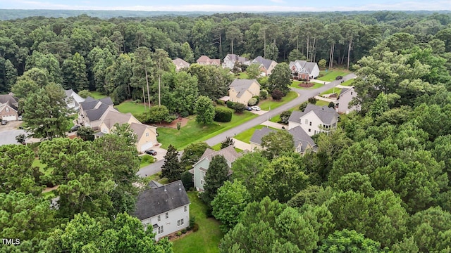 6104 Spicewood Dr, Fuquay Varina, NC 27526 - aerial view of residential area with a heavily wooded area