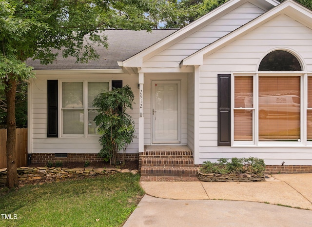 2912 Enson Pl, Raleigh, NC 27603 - property entrance with a shingled roof