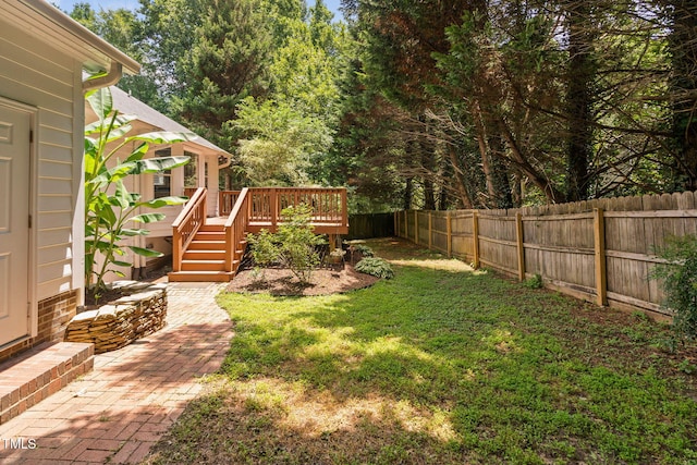2912 Enson Pl, Raleigh, NC 27603 - fenced backyard with a wooden deck