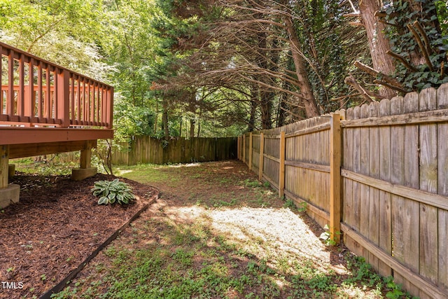 2912 Enson Pl, Raleigh, NC 27603 - fenced backyard featuring a wooden deck