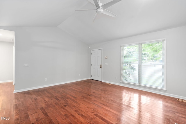 2912 Enson Pl, Raleigh, NC 27603 - unfurnished living room with a ceiling fan, wood finished floors, and lofted ceiling