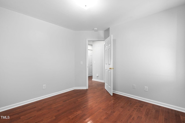 2912 Enson Pl, Raleigh, NC 27603 - empty room with baseboards and wood finished floors