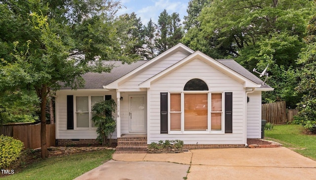 2912 Enson Pl, Raleigh, NC 27603 - view of front of home with a shingled roof and crawl space