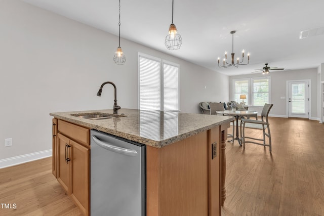 1003 Branwell Dr, Durham, NC 27703 - kitchen with dishwasher, open floor plan, light wood-style flooring, a kitchen island with sink, and ceiling fan
