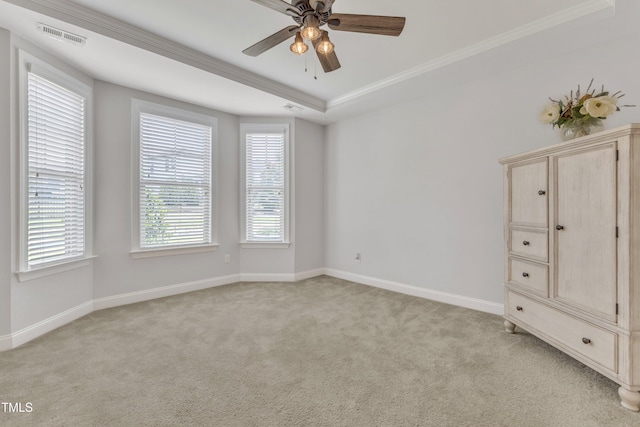 1003 Branwell Dr, Durham, NC 27703 - unfurnished bedroom featuring ornamental molding, light colored carpet, and a tray ceiling