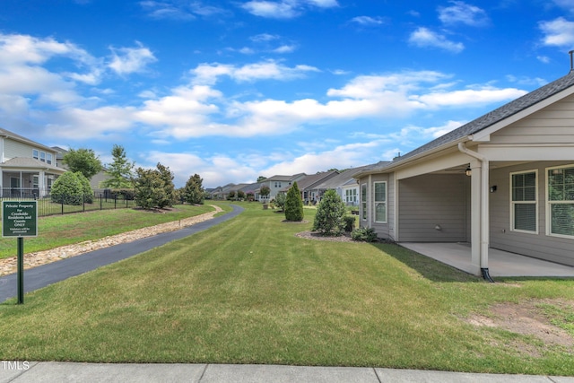 1003 Branwell Dr, Durham, NC 27703 - view of yard featuring a patio area and a residential view