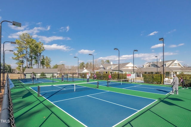 1003 Branwell Dr, Durham, NC 27703 - view of tennis court featuring a residential view