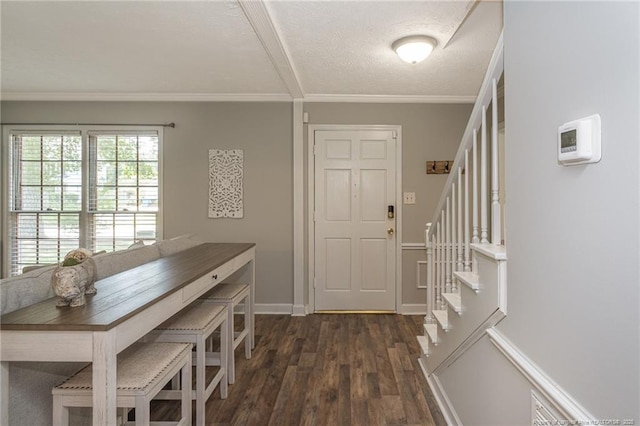 3516 Worley St, Fayetteville, NC 28311 - entryway featuring stairs, dark wood-style floors, and crown molding