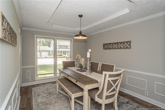 3516 Worley St, Fayetteville, NC 28311 - dining area featuring wood finished floors, a textured ceiling, a decorative wall, a wainscoted wall, and ornamental molding