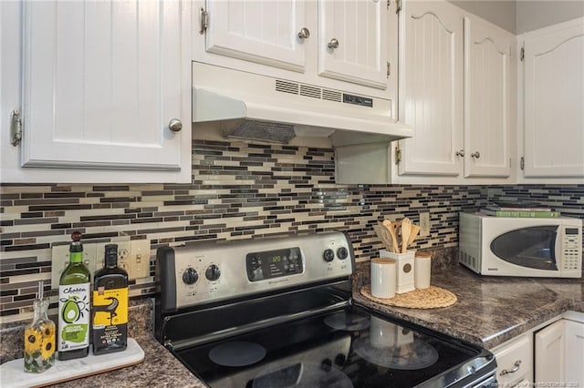 3516 Worley St, Fayetteville, NC 28311 - kitchen featuring stainless steel range with electric stovetop, white microwave, tasteful backsplash, under cabinet range hood, and white cabinets