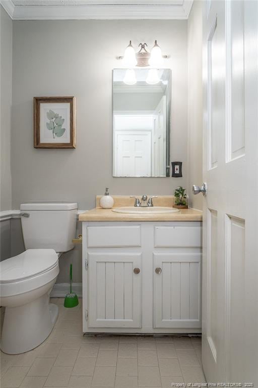 3516 Worley St, Fayetteville, NC 28311 - bathroom featuring vanity, tile patterned flooring, and ornamental molding