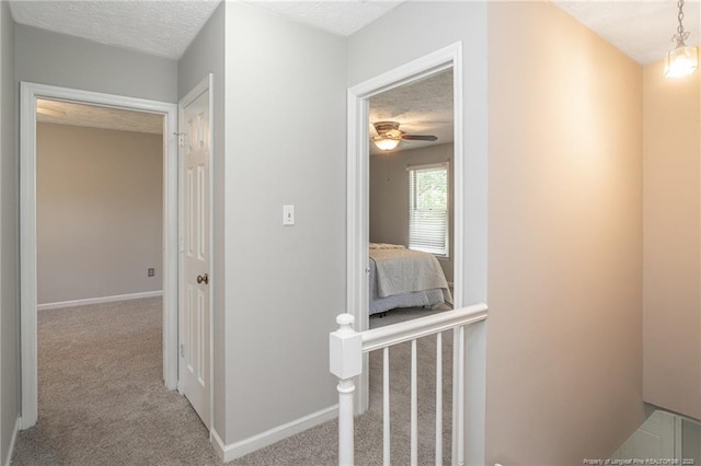 3516 Worley St, Fayetteville, NC 28311 - hallway featuring carpet and a textured ceiling