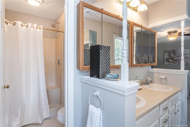 3516 Worley St, Fayetteville, NC 28311 - full bathroom featuring a textured ceiling, double vanity, and shower / tub combo
