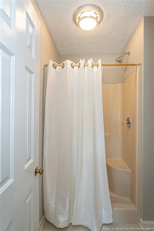 3516 Worley St, Fayetteville, NC 28311 - bathroom with a textured ceiling and a shower with curtain